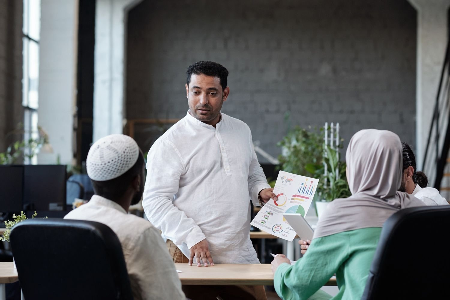 confident businessman with financial paper looking zwvq27j